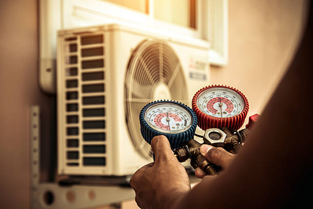 Professional Air Conditioning Service technician working in Jefferson, OH